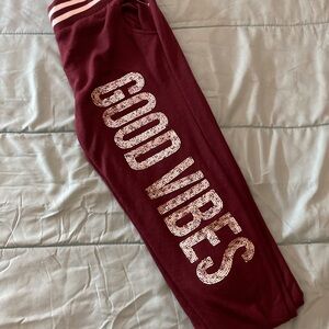 Rue21 Burgundy joggers with Good Vibes Print